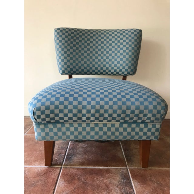 This stylish, mid-Century lounge chair makes a perfect focal point or secondary seating option. It will bring a unique...