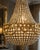 Late 20thC French Louis XVI Black Gold Chandelier For Sale - Image 4 of 8
