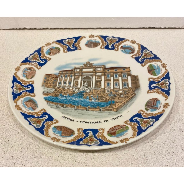 Made in Italy by Richard Ginori, this beautiful plate highlights the trevi fountain and has vignettes of all the top...