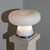 Large 1960s table lamp attributed to Fontana Arte, featuring a conical base, chrome fittings, and a large circular opaline...