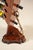 A distinctive floor-standing wine rack designed to hold five bottles horizontally for proper storage and easy display. The...