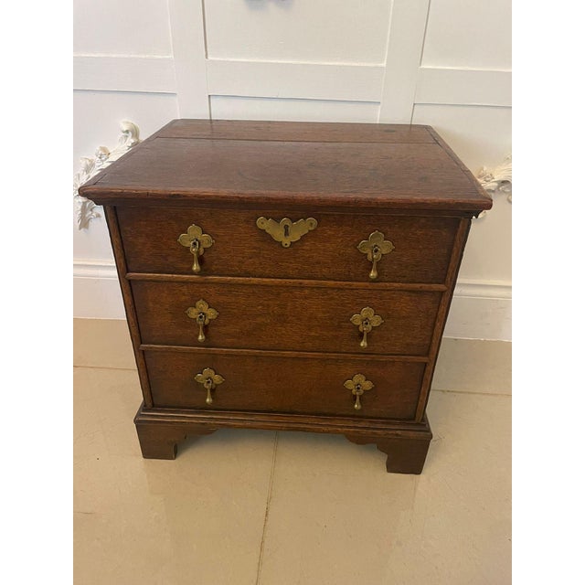 Antique Queen Anne quality oak box chest having a quality oak lift up top with a moulded edge opening to reveal a storage...