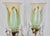 We are offering an exquisite pair of antique brass lamps with Steuben “Pulled Feather” pattern glass shades. The lamps...