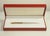 Santos Brushed Steel and 18 Karat Gold-Plated Stylo Bille Must II Ballpoint Pen with Red Box from Cartier, 2000s, Set of 3 For Sale - Image 9 of 15