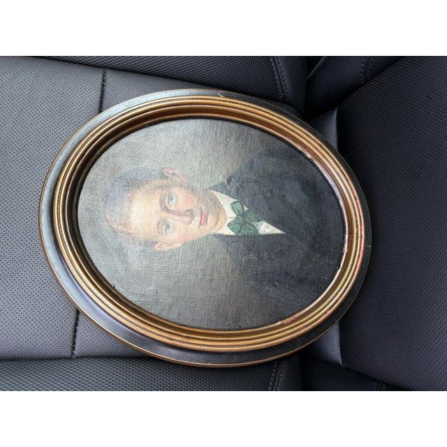 Early 19thc oval portrait painting of a young gentleman on a antique oval frame. The condition is very good with no...