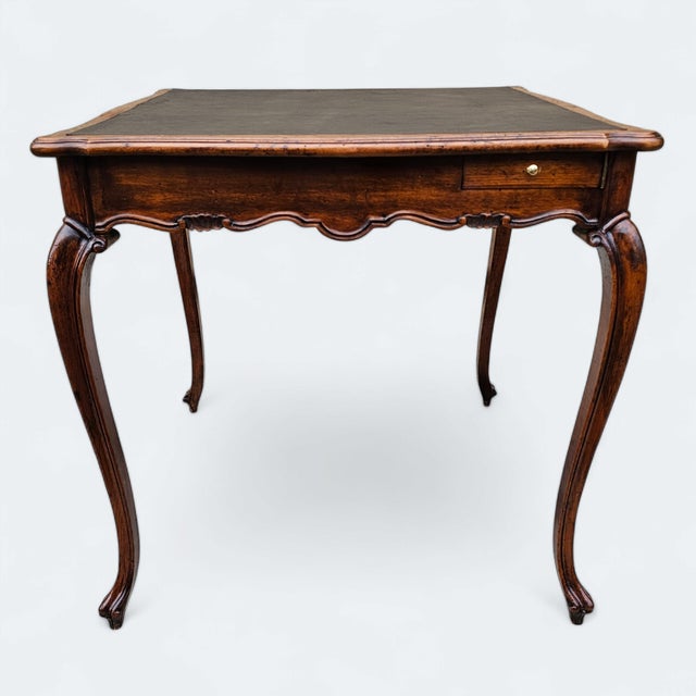 This 19th-Century Antique Leather-top Walnut GameTable has a timeless style, with its original black leather surface that...