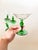 Incredible Antique Art Nouveau style green stemmed champagne coupes or martini glasses with floral form in the bowl of the...