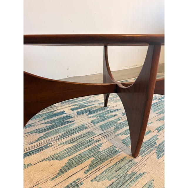 Authentic vintage G Plan “Astro” oval coffee table, featuring the iconic sculptural base and inset glass top. This British...