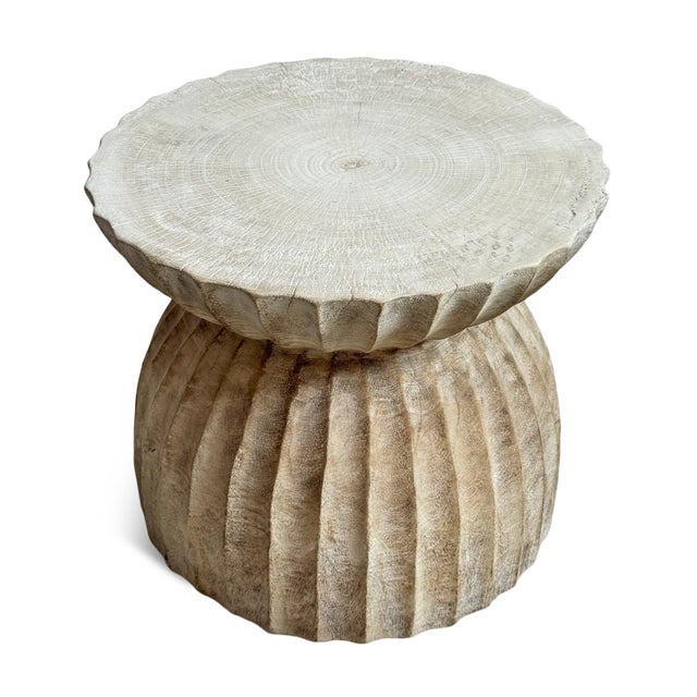 Solid wood beautiful side table showcasing an hourglass silhouette with hand-carved scalloped detailing and a whitewashed...