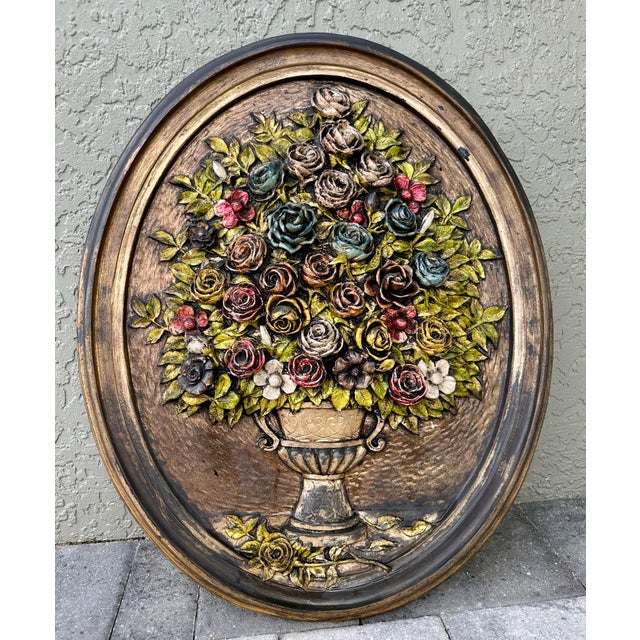 Vintage 1970s era large oval-shaped three-dimensional wall art plaque. This beautiful piece of artwork seems to be made...