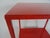 CUSTOM TABLE In the manner of Billy Baldwin custom-made metal side table. Two tiers. Made of Steel. Red finish. Custom!...