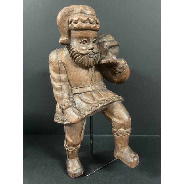 ITEM NAME: Late 20th Century Carved Wood Santa Claus Sculpture ORIGIN: Philippines AGES: Late 19th Century MATERIALS: Wood...