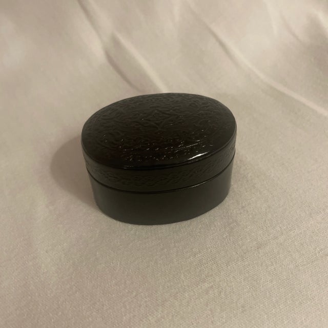 Hand tooled Leather oval box made in Italy with classical decoration