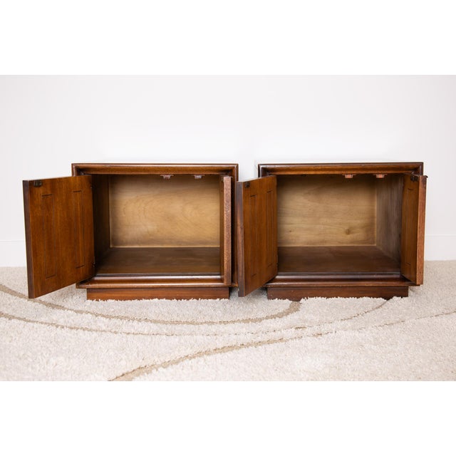 An uncommon pair of mid-century modern Broyhill Premier Emphasis commode/end tables in rich, dark walnut finish. Large...