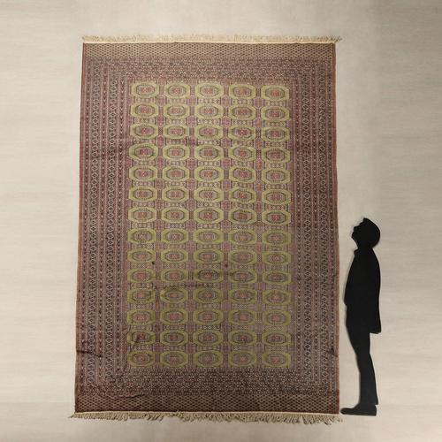 Bukhara rug in cotton and wool, fine knot, hand-made. This piece is attributed to the mentioned designer/maker. It has no...