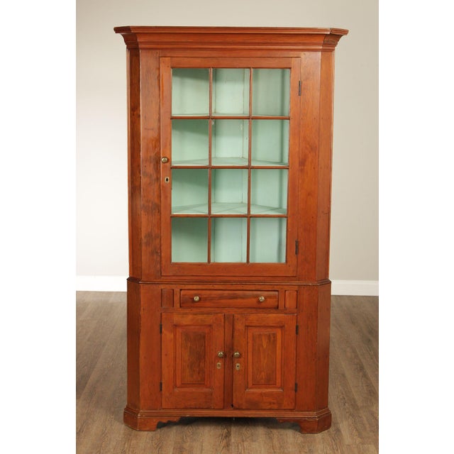 High Quality Antique 19th Century Softwood Corner Cabinet with Twelve-Pane Door Opening to Painted Interior Shelves