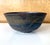 A large ceramic bowl (Chawan) by Japanese American artist Toshiko Takaezu (American, 1922 - 2011). The deep form bowl...