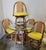 Four Rattan Swivel Chairs With Matching Table and Yellow Upholstery For Sale - Image 4 of 12