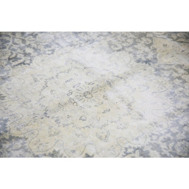 Introducing a one-of-a-kind vintage Turkish hand-knotted wool rug, carefully crafted by skilled artisans using traditional...