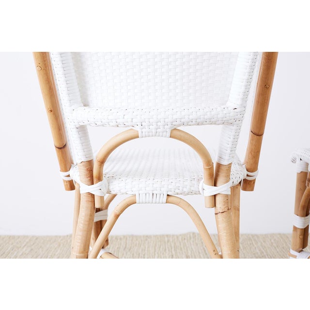 Serena and Lily Bamboo Riviera Rattan French Bistro Chairs ... Made up of 2 chairs and a coffee table, bistro sets provide a beautiful spot for morning coffees or sunset drinks.