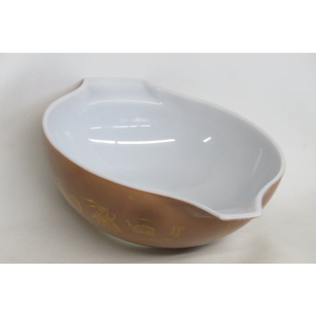 This wonderful Mixing / Serving Bowl made out of opal glass with enamel glaze. This bowl was made in the USA by Pyrex and...
