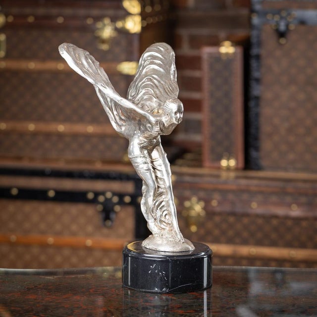 A 20th Century English silver plated model of the legendary Rolls-Royce mascot which was designed by Charles Sykes, this...