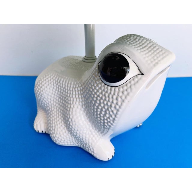 Iconic Italian glazed porcelain frog lamp in the style of Jean Roger with adorable raised Hobnail skin and big hand...