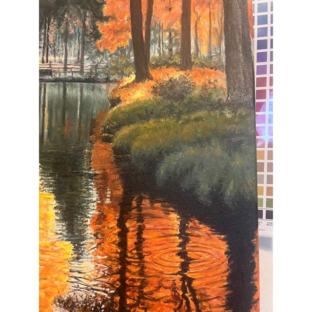 Original oil painting by Steve Schaaf. This striking autumn landscape captures a peaceful forest stream illuminated by the...