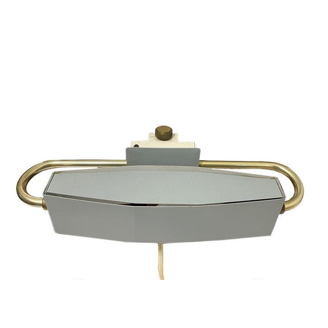 A bed lamp or painting lamp made by Jacques Biny for Lita France, during the 50s. You can attach the lamp to any object,...