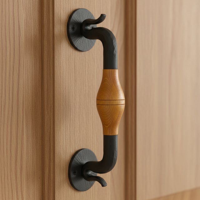 The Perfect Blend of Wood and Iron Upgrade your entryways with this exceptional mixed material door pull. By blending the...