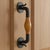 The Perfect Blend of Wood and Iron Upgrade your entryways with this exceptional mixed material door pull. By blending the...