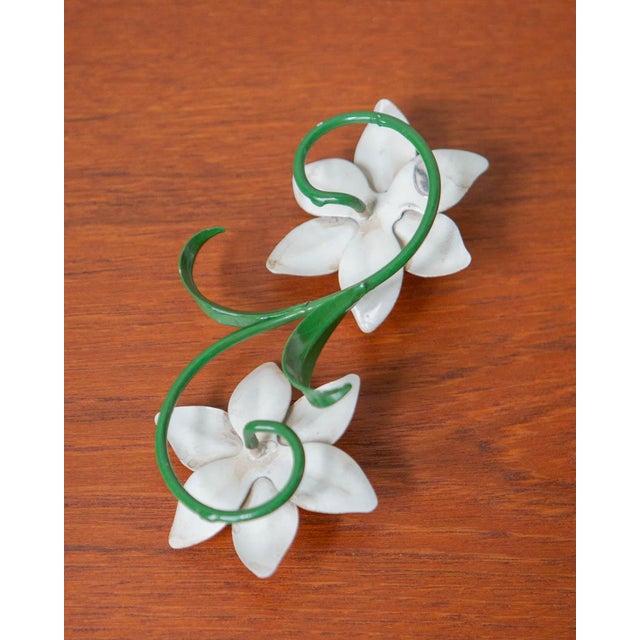 Delicate looking small taper candle holders in metal. Each holder can accommodate two thin/tiny taper candles. Grass green...