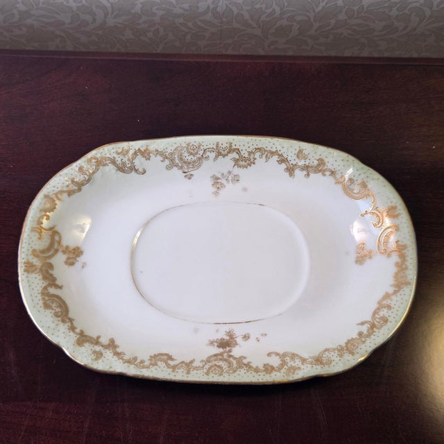 Antique Elite Works Limoges Two-Handled Gravy Boat - Celadon Dots and Gilded Scrolls Elevate your holiday table with this...