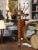 Both decorative and practical, this antique hall tree brings architectural character to an entryway, dressing room, or...