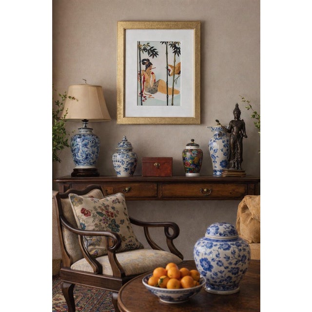 This refined Asian decorative artwork is meticulously crafted from natural leaves, carefully cut and assembled to form an...