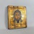 A rare and evocative Orthodox sacred icon painted on wood depicting Christ Pantocrator, accompanied by a period appraisal...