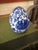 This vintage blue and white chinoiserie porcelain egg features an elegant floral and scrolling vine motif inspired by...