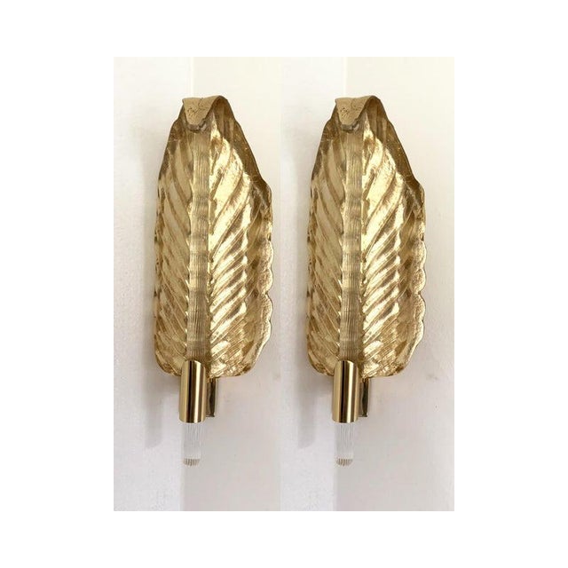 Set of two mid-century modern gold-leaf murano glass wall sconce brass metal frame for 1 buls scenographic murano glass...