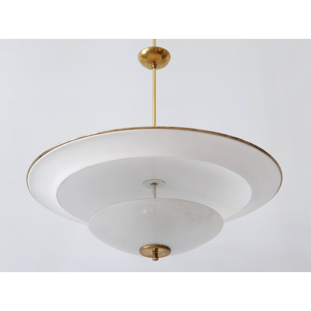 Large, rare and highly decorative mid-century modern 'ufo' ceiling light or pendant lamp. Designed & manufactured in...