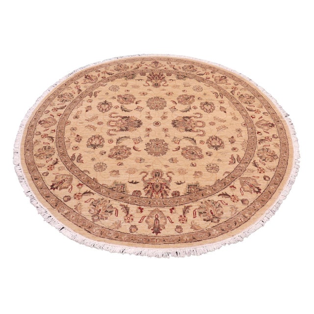 Transform your space with the Kafkaz Chobi Peshawar Round Hand‑Knotted Wool Rug, crafted by skilled Turkish artisans using...