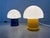 Small ‘mushroom’ table lamp by Massive. The lamp has a yellow or blue plastic base and a white plastic shade. E14 fitting....