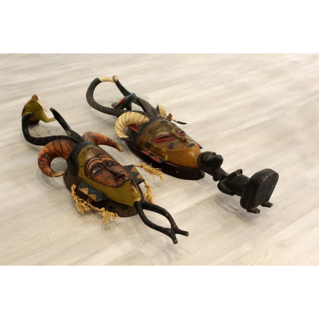 A magnificent pair of masks – noted as Pierre Osso (Guro Tribe, Ivory Coast) Secret Society Ancestors. Circa 1960s. From a...