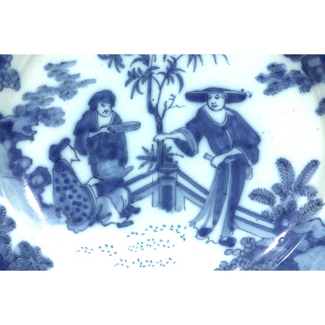 Blue & White Dynasty: Large 17th-Century Dutch Delft Chinoiserie Dish Step back to the late 17th century with this...