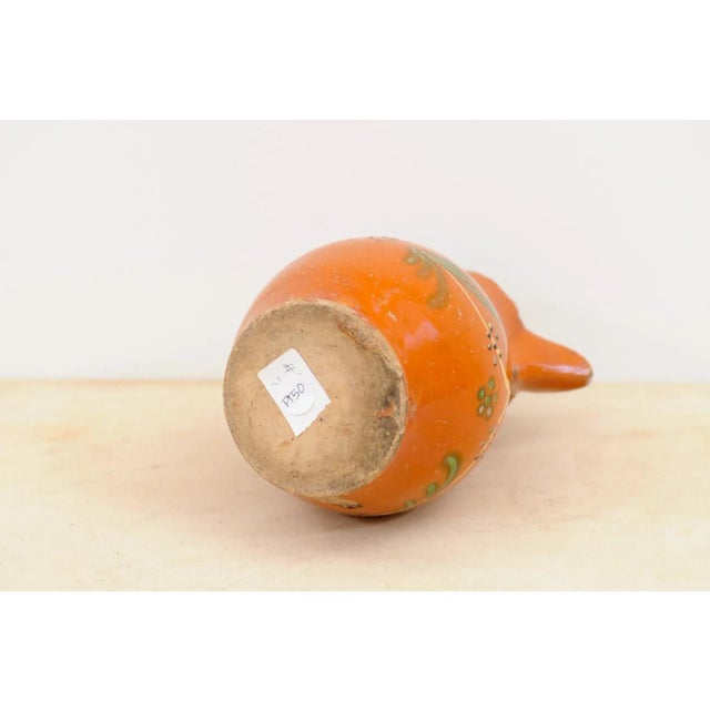 19th Century French Redware Floral Pitcher with Orange, Cream and Green Glaze For Sale - Image 11 of 12