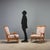 Two reclining armchairs from the 1950s crafted by Camea, identifiable by the branded mark. The structure is wooden with...
