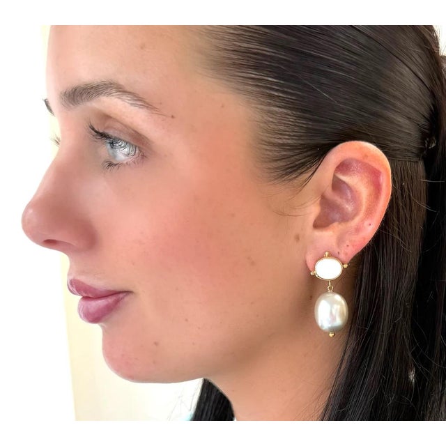 We love this earring. Dress it up or dress it down, you will get a lot of wear out of this pearl drop style. Lightweight...
