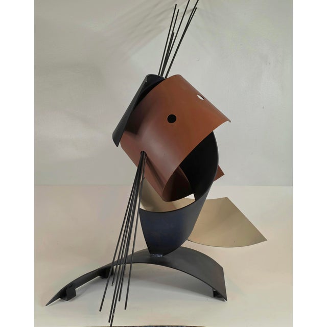 Magnificent Post Modern Metal Sculpture By Curtis Jeŕe. Features An Array Of Crescent & Ribbon Shaped Rings With A Bundle...