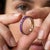 Indulge in the regal beauty and rich, velvety hues of this stunning full-eternity band. Masterfully crafted with an...