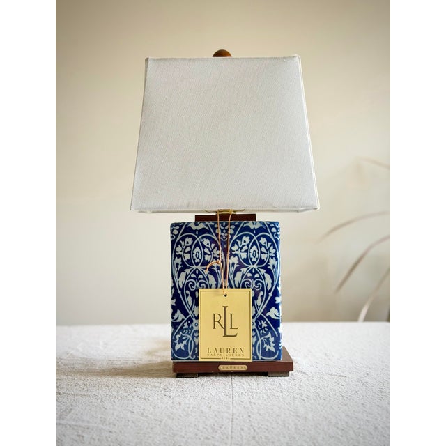 Ralph Lauren Home porcelain table lamp in cobalt blue and white chinoiserie, decorated with a repeating vineyard vine...