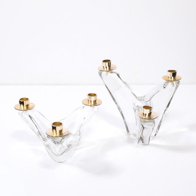 This near pair of mid-century three-arm candelabra, signed Schneider, captures the poetic elegance of French design circa...